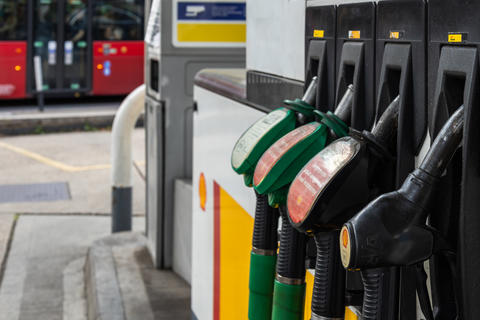 Fuel pump nozzles at a Shell gas station. London, UK, 29 July 2023