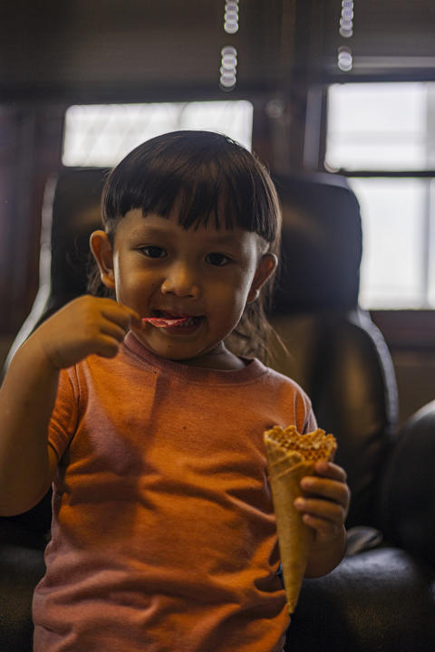 Toddler Scooping Ice Cream