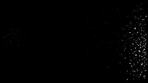 Small white splashes around the edges of a black screen
