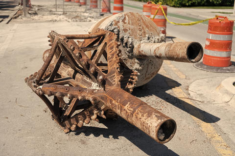 Large drill head. Part of heavy machinery on construction site for drilling. Drilling rig. Heavy