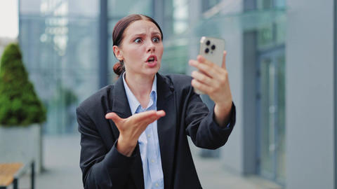 Woman Reacts Angrily During Video Call On Smartphone