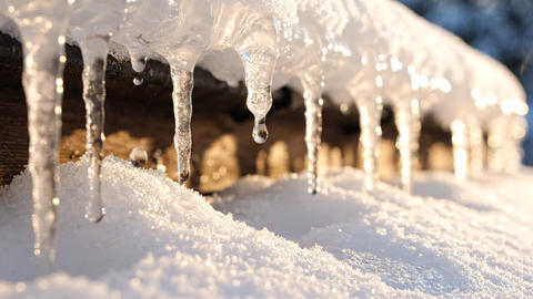 Icicles Melting - Winter Roof with Water Dripping