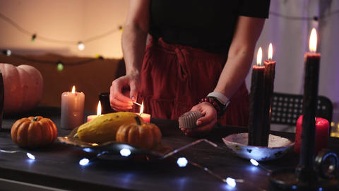 Girl Decorating Halloween Room