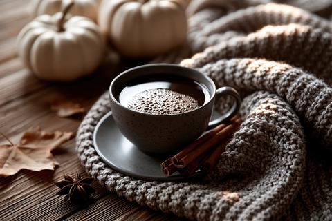 Cozy autumn flat lay pumpkins knitted blanket hot coffee fall