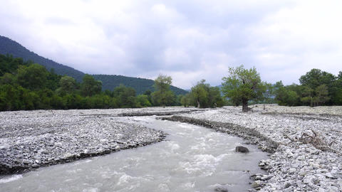 Scenic view of tranquil natural scenery. Mountain river in the Caucasus region