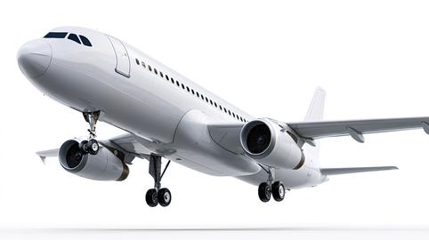 White commercial airplane taking off or landing with landing gear down