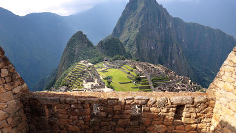 Machu Picchu Through Ancient Stone Walls