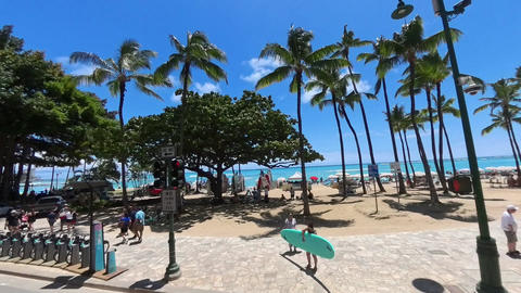 Driving along Waikiki Beach, Hawaii, on a sunny day