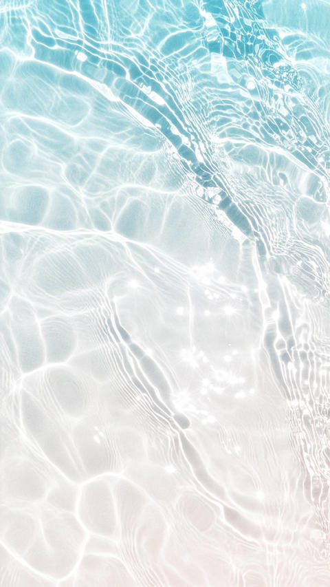 Shimmering light reflections on the tropical shallow water, beautiful rippling waves