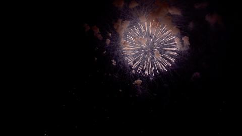 bright night spectacle, moonlit fireworks evoke calm atmosphere, gentle luminous