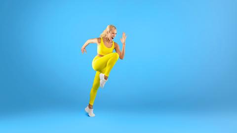Active Young Woman Running And Training In Bright Yellow Sportswear, Fitness