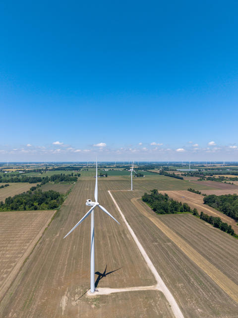 Wind Turbines Over Rural Ontario Farmland