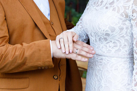 The bride and groom s hands with their wedding rings during the wedding ceremony