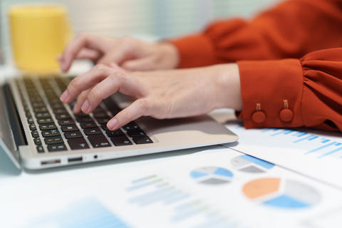 Professional Planning Career Strategy While Working on Laptop