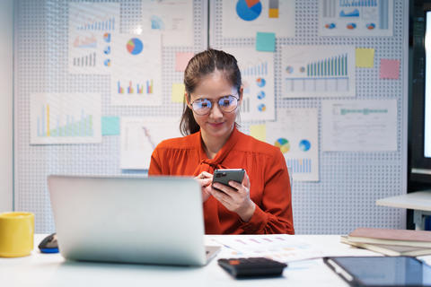 Professional Woman Considering Career Opportunities While Working