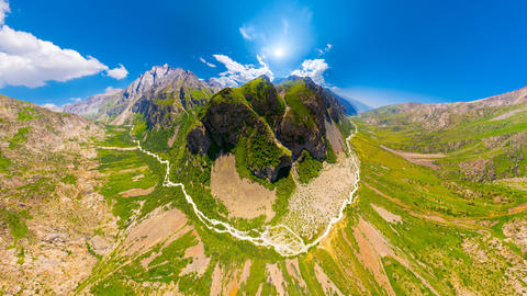 Aerial view of majestic mountain range with winding river