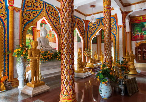 THAILAND - 12 OCTOBER 2024: A Stunningly Beautiful Buddhist Temple Interior Featuring Golden Statues