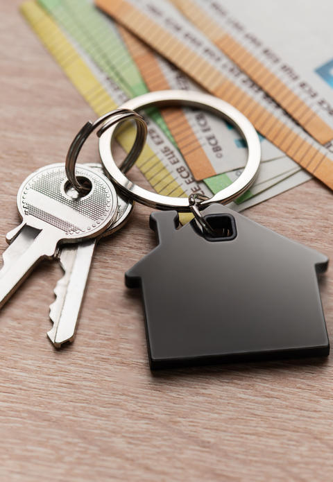 House keys with keychain representing new home ownership