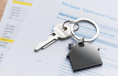 House keys with keychain representing new home ownership