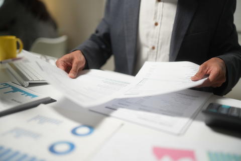 Business Professional Reviewing Financial Documents