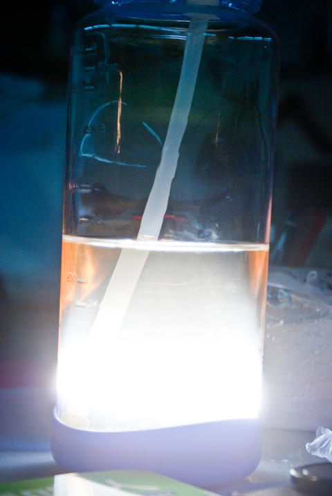 Glowing Plastic Water Bottle Lit From Below