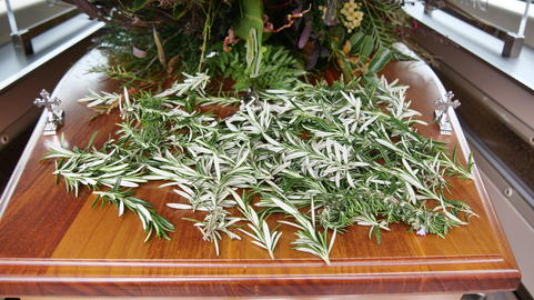 closeup shot of a funeral casket or coffin in a hearse