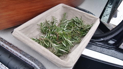 shot of Rosemary herb leaves in a basket for a funeral service