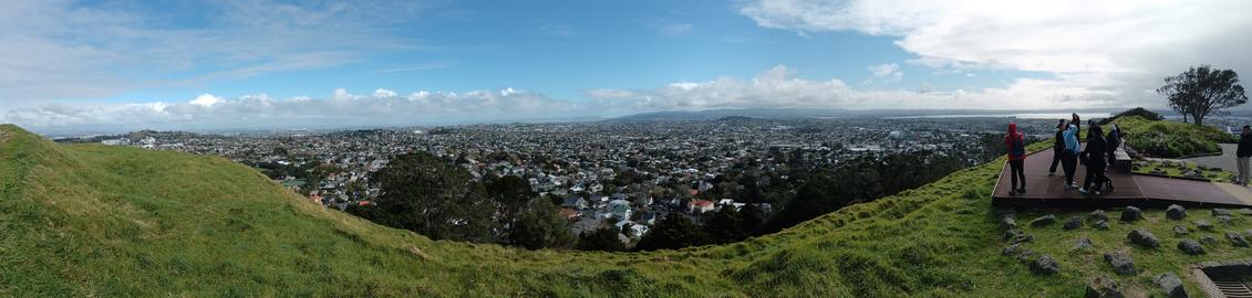 Panoramic view of Auckland spreading across rolling volcanic hills