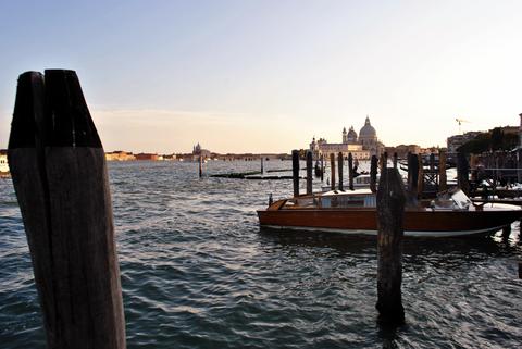 View of Venice with moored boat and Basilica della Salute in the background