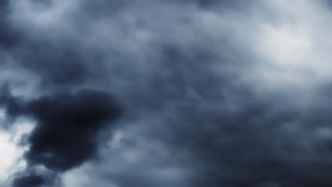 Dark Storm Clouds Swirling in Dramatic Sky