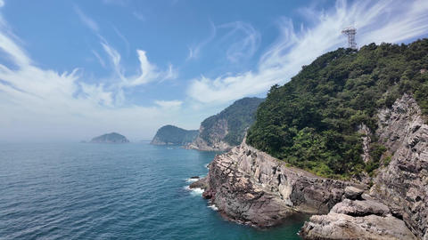 Aerial View of Forested Coastal Cliffs and Islets off Busan