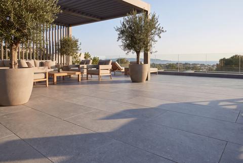Luxury Outdoor Terrace Patio with Stone Paving and Pergola in Modern Villa