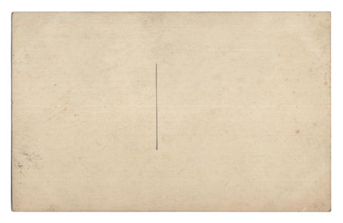 Old empty postcard isolated on white