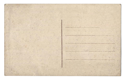 Old empty postcard isolated on white