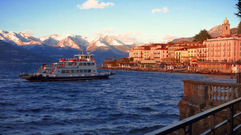 Ferry Boat in Bellagio on Lake Como with Snowy Mountains