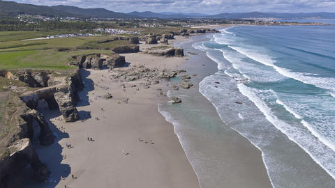 Aerial panorama of Praia das Catedrais beach and sea cliffs Spain