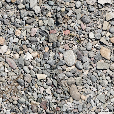 Seamless gravel stone texture background pattern