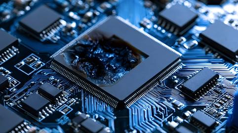 Burnt cpu chip showing severe damage on a computer motherboard