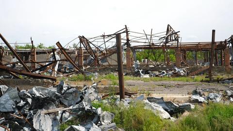 View to destroyed residential buildings at Kharkivska oblast. Ruined houses after bomb attacks on uk