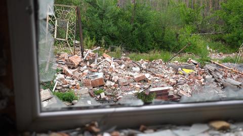 View to destroyed residential buildings at Kharkivska oblast. Ruined houses after bomb attacks on uk