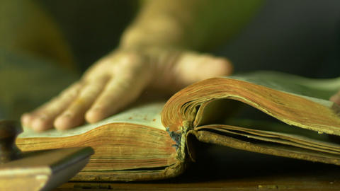 HD Antique Book Hand Flipping Pages Macro
