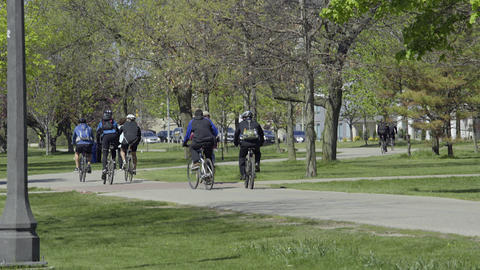 Cyclists riding in the Park. 4K UHD