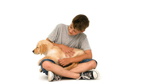 Happy boy with his puppy