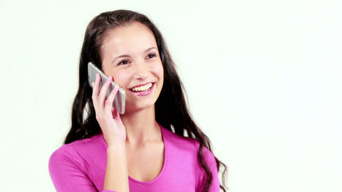 Smiling woman talking on her phone