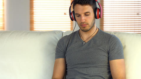 Man listening to music on his phone
