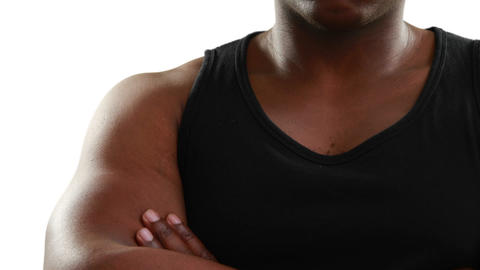Muscular man with arms crossed