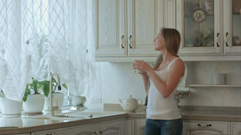 Couple enjoys an early morning coffee at home