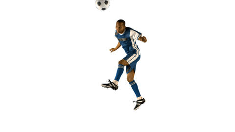 Football player heading the ball