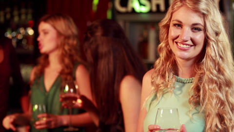 Smiling woman with wine glass